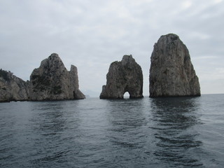 Fototapeta na wymiar View of the Faraglioni, which are rock formations off the coast of Capri, Italy 
