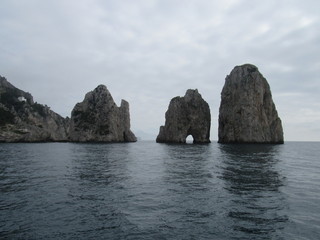 Naklejka premium View of the Faraglioni, which are rock formations off the coast of Capri, Italy 
