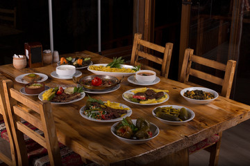 assorted turkish kebabs on wooden table