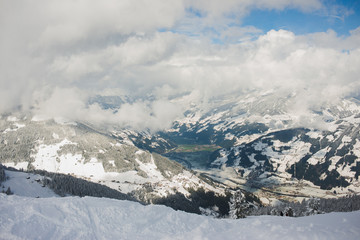 Ski slope, resort and outdoor activities in the winter in the Alps.