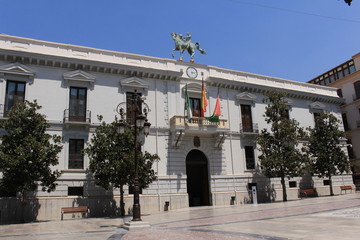 Fototapeta premium Granada city hall building with a horse statue on top in Andalusia, Southern Spain.