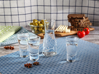 Traditional greek ouzo in shot glasses