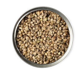 Raw hemp seeds in tin can isolated on white background, top view