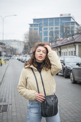 Stylish girl posing for a photographer