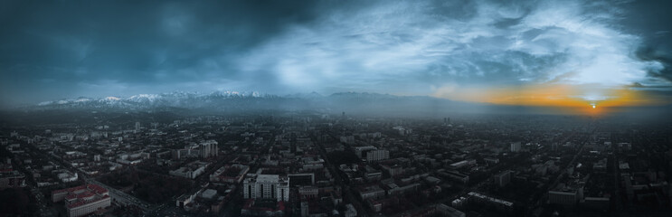 Obraz premium Panorama of the city in the mountains view from the drone