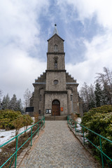 Szklarska Poreba / Poland - May 25 2019: The Norwegian Valley is a complex of 7 houses has its own individual character, and their surroundings have been decorated with original elements.