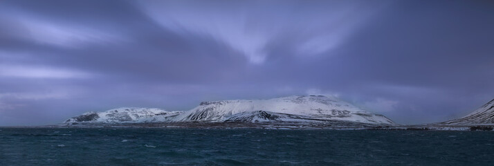 Snow covered mountains on the west coast of Iceland