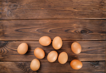 Fresh eggs on  wooden background