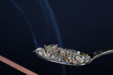 Muscatel sage spreads a pleasant scent after lighting and is therefore very suitable for smoking meat and fish, photographed in the studio.