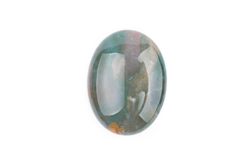 Oval cabochon stone in green on a white isolated background