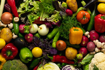 Obraz na płótnie Canvas Composition with assorted raw fresh mix vegetables. Variety vegetable top view background.