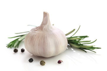 Garlic and rosemary isolated on white background