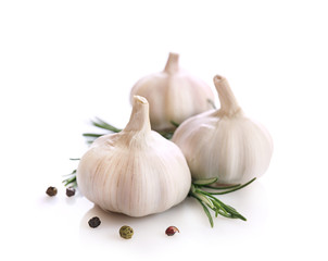 Garlic and rosemary isolated on white background