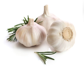 Garlic and rosemary isolated on white background