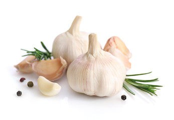 Garlic and rosemary isolated on white background