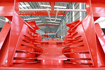 The parts of the forage harvester are in a factory, Luannan County, Hebei Province, China.
