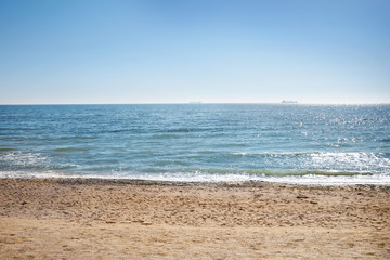 Fototapeta na wymiar Lanscape. Blue sea, sand and sky
