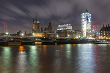 London in the night, Houses of Parliament over river Thames, Big Ben under renovation