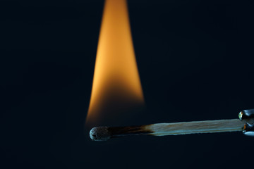 Lit matches and blown out in the studio photographed with colorful foils before the flashes