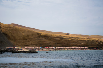 La Mina beach in the afternoon with several beachers and tourists