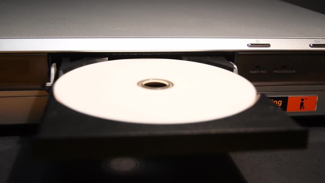 DVD player insert disc and close tray. Italy