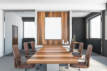 White and grey meeting room interior with poster