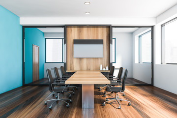 White and blue meeting room interior with TV