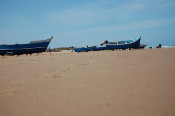 Obraz premium Traditional handmade blue Sea boats waiting for next ride