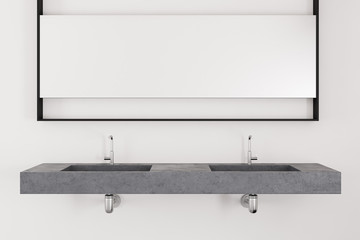 Stone double sink in white bathroom
