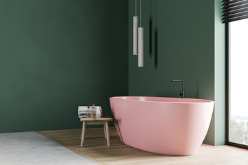 Obraz na płótnie Canvas Green bathroom corner with pink tub