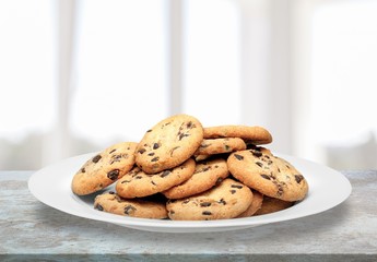 The plate of delicious chocolate chip cookies