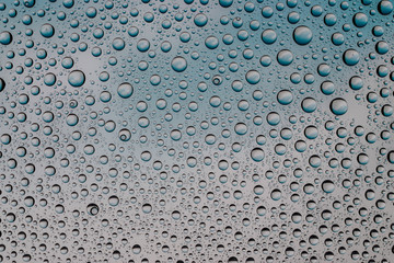 Drops texture. Wet water on glass background. Bubble pattern.