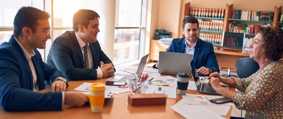Business lawyers workers meeting at law firm office. Professional executive partners working on finance strategry at the workplace