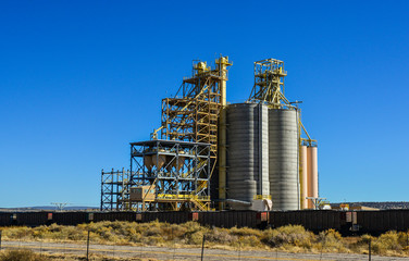 Fototapeta na wymiar USA, ARIZONA - NOVEMBER 18, 2019: large towers for storing bulk materials in a suburb of Phoenix, Arizona USA