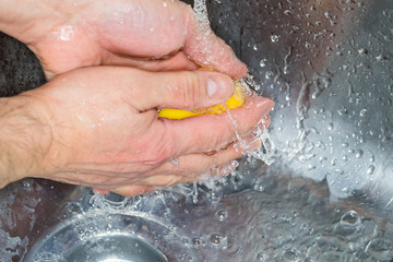 Cleaning hands with simple soap and water. to remove, dirt, bacteria and germs. For good personal...