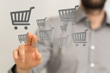 Online shopping business concept selecting shopping cart.