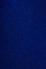 Blue glowing dynamic festive background shining sparkles bokeh. Glitter texture, holidays concept. Trend color 2020, layout for design. Trendy color concept of year, classic blue background.