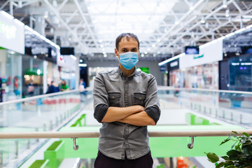 Man wearing mask for protect Novel Coronavirus:2019 or PM 2.5 dust and serious of the air pollution in department store.