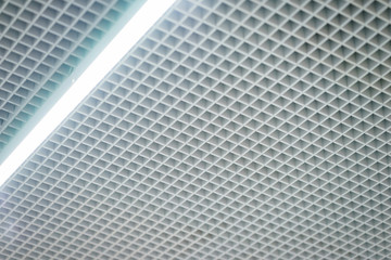 Lighting and ceiling finishes in of the modern ceilings and interior in the office.