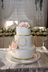 Beautiful wedding cake with flower roses