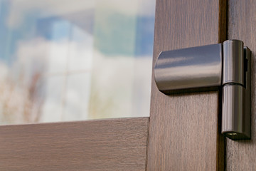 Fragment of a plastic door during installation