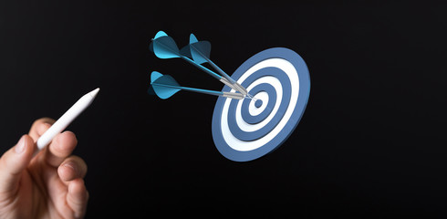 dart target arrow hitting on bullseye which is the ultimate goal that everyone wants.