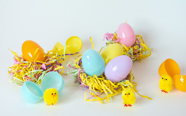 easter eggs and chickens on white background