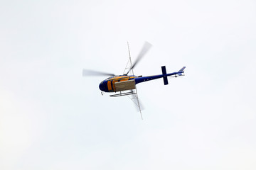 Agricultural helicopters fly in the air