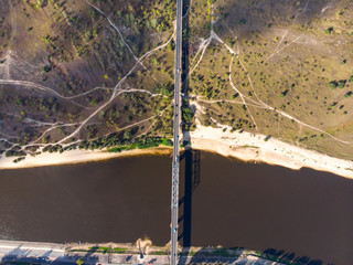 Metal bridge over the river landscape