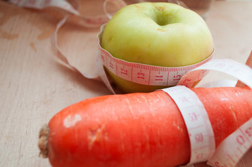 apple and measuring tape