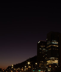 Fototapeta premium buildings at sunset in the city