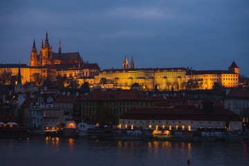 Evening walk and sightseeing while traveling in the fall to Prague, Czech Republic. Charles bridge and promenade. Eurotrip. Historic cities in Europe. Autumn in Prague, Europe Travel.