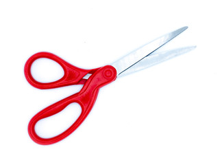 Red scissors on a white background