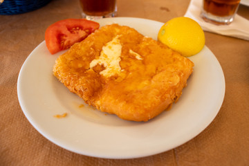 greek cuisine fried hard cheese served on a plate